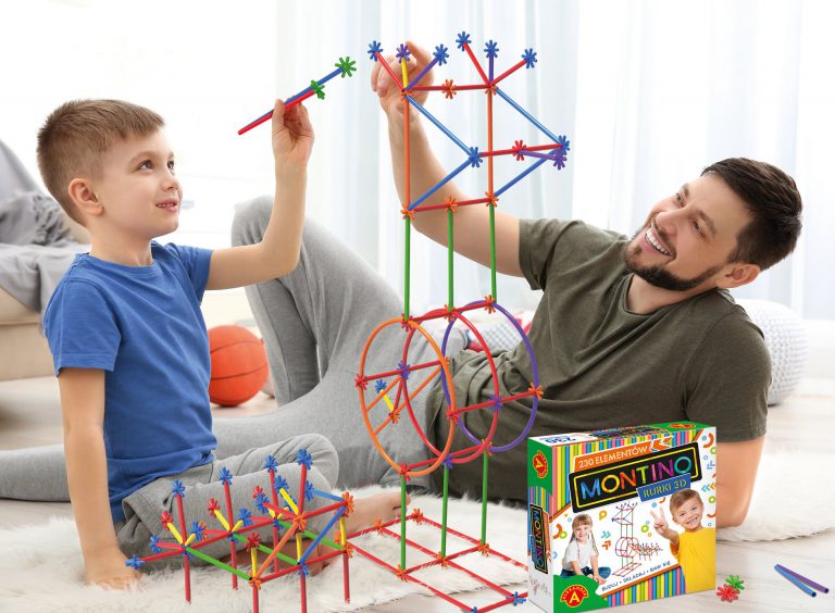 Father playing with his son at home